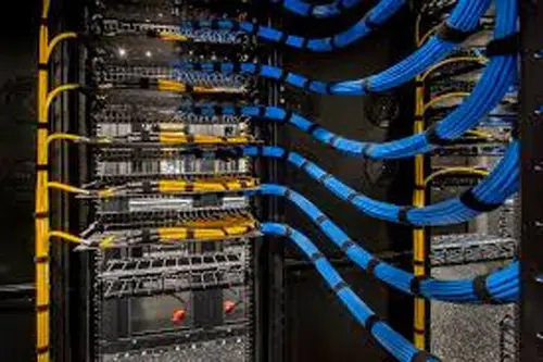 Efficient Structured Wiring: An image showcasing the installation of low voltage structured wiring, ensuring a well-organized and efficient network infrastructure. Experience reliable connectivity and optimized performance for your various technology systems and devices.